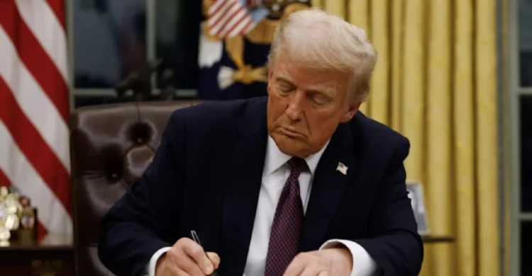 Trump signs $900 bn defense policy bill into law