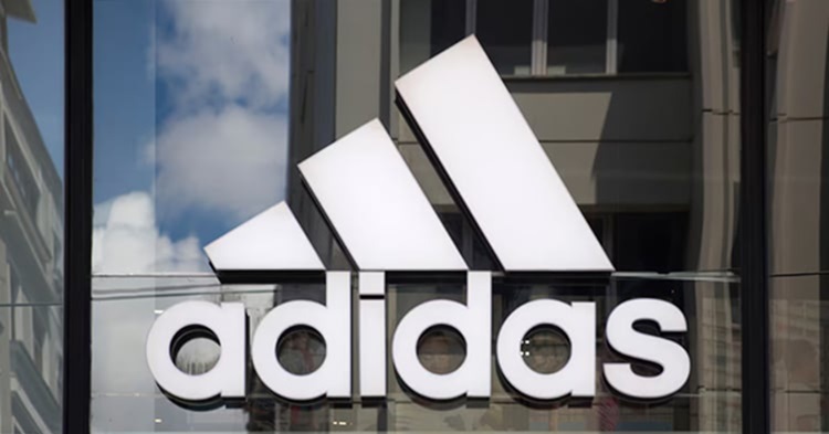 Adidas reports hit from US tariffs