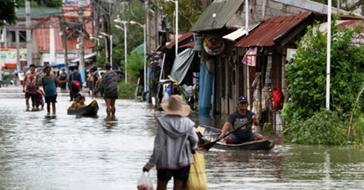 Boats bring food, safe passage for Philippine flood victims