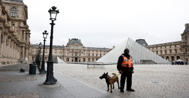 France's Macron orders tighter security as Louvre reopens doors